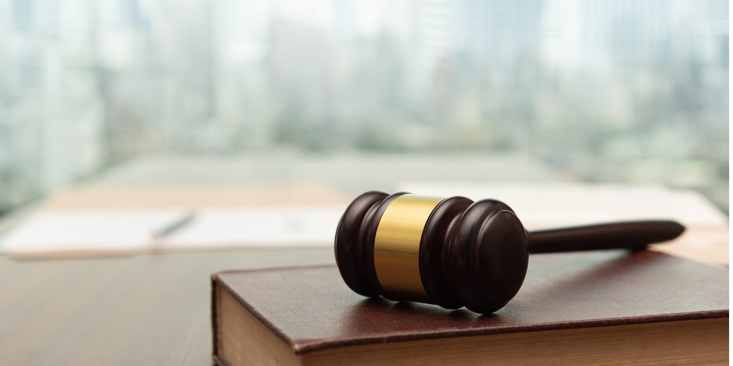 judge-gavel-on-law-books-picture-id1163081128 (1)